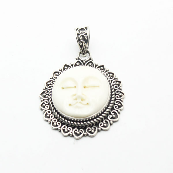 Bone face pendant
